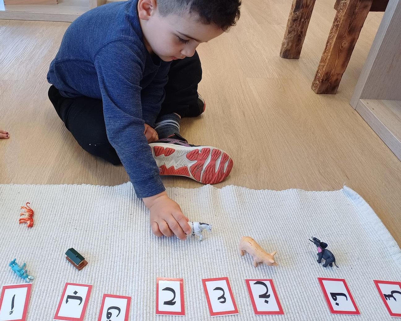 Children engaged in Montessori work